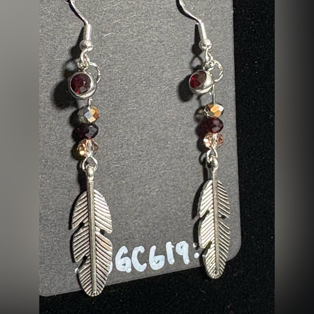 Silver Feather Earrings Dangle Metal Feather Textured With Red Crystal Accents